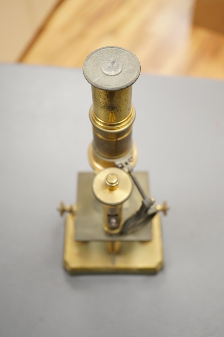 A mid 19th century French brass monocular microscope, 26cm high